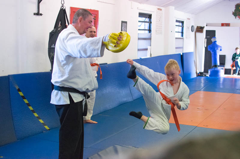 Kids Performing Flying Kicks