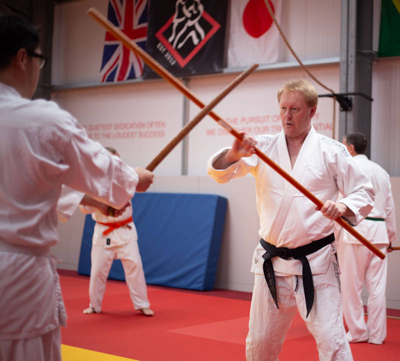 Chris using bo staff at Ju-Jitsu Weapons Seminar 2025